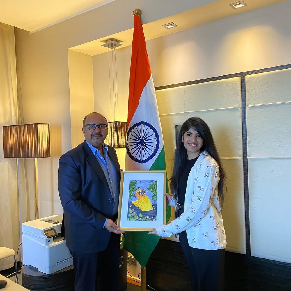 Presenting her work to Ajaneesh Kumar, Ambassador of India to Estonia — Tallinn, 2022